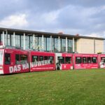 Mobile Werbebotschaften für das Handwerk auf einer Straßenbahn und auf Bussen