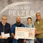 1000 Euro von der Tanzschule Pelzer an die Schweinfurter Kindertafel als Erlös aus der Casino Royale-Party