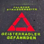 Geisterradler-Sprühaktion als Warnung für Radfahrer, die in der falschen Richtung unterwegs sind