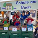Teilhabe dank sprechendem Kaufladen: Schonunger Schule am Bach mit „KidsMarktstand“ in Aschaffenburg