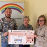 5.000 Euro von der Firma NEWO-Bau an die Station Regenbogen in Würzburg