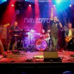 Das Programm für den März 2026 im Stattbahnhof: Led Zeppelin, die Eagles und die Little River Band kommen – fast