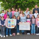 Kommunionkinder aus Rottendorf spenden 715 Euro für Harl.e.kin-Nachsorge