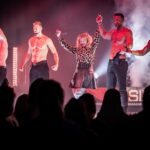 “Gruppen-Special“ für SIXX PAXX: Europas begehrteste Männer kommen zur Theater Revue in den Bad Kissinger Regentenbau – und bringen Hubert Fella mit