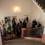 „Mit anderen Augen“: Fotoausstellung macht Wohnungslosigkeit in Würzburg sichtbar